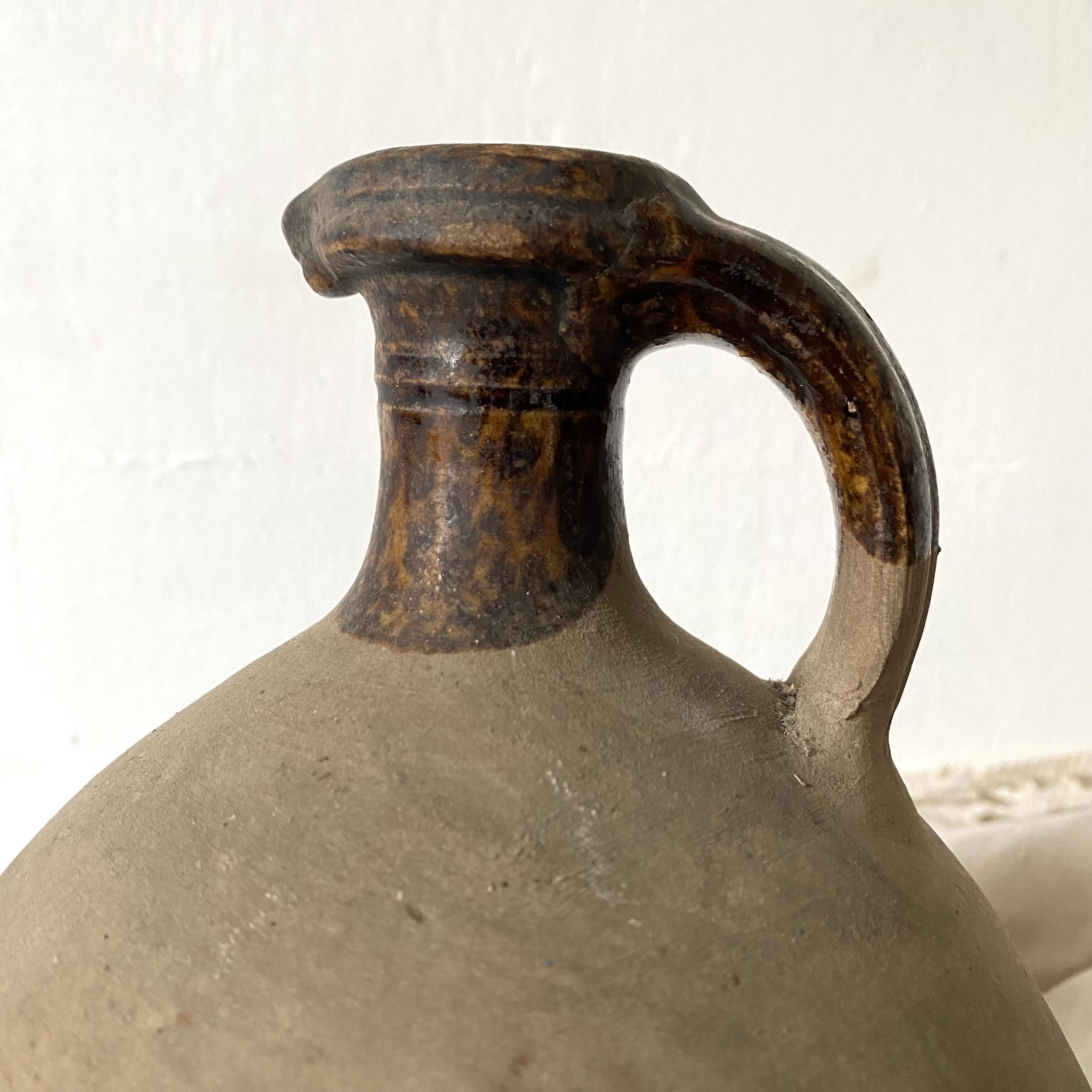 Antique jug, terracotta jar