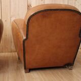 Pair of Art Deco leather club armchairs from the 1930s.