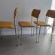 LM vintage chrome and orange/mustard yellow faux leather chairs