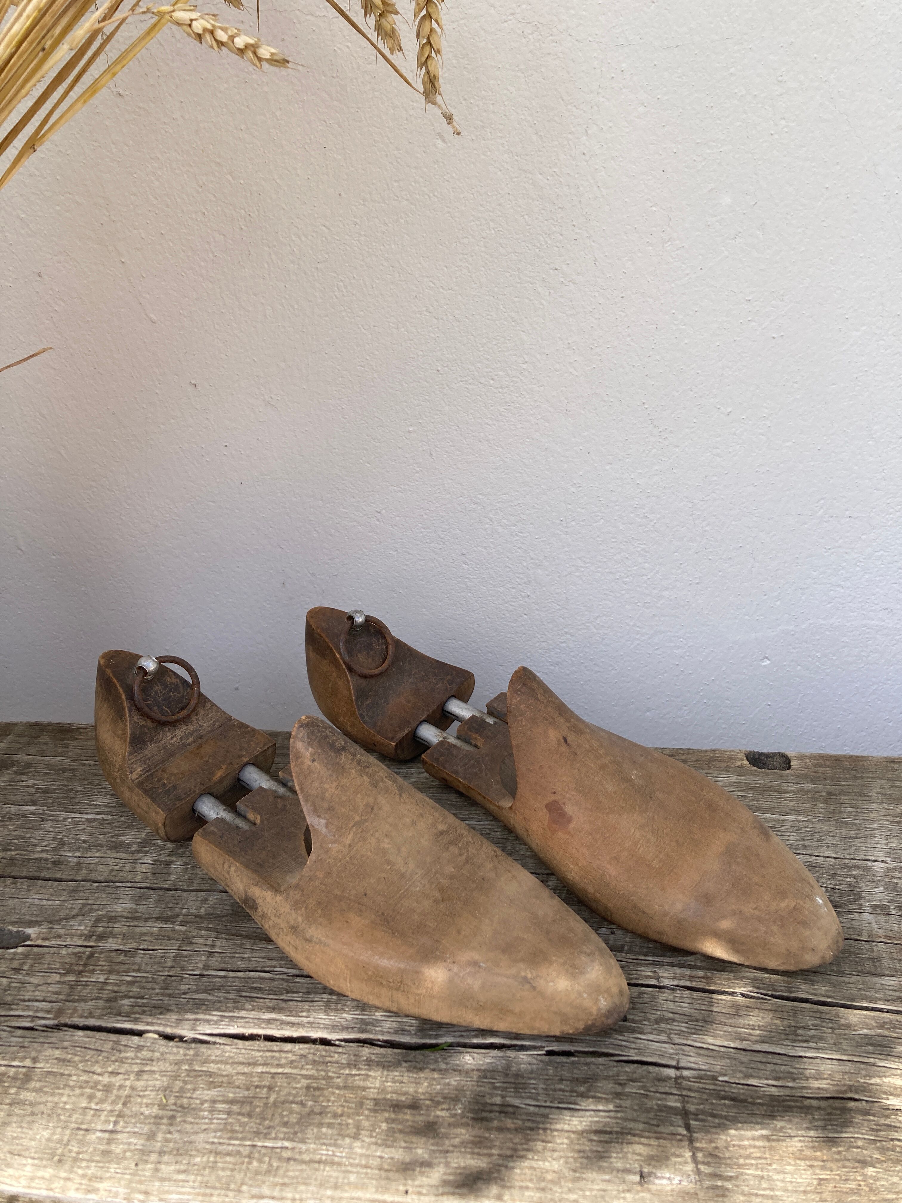 Old wooden shoe trees shapes vintage shoes