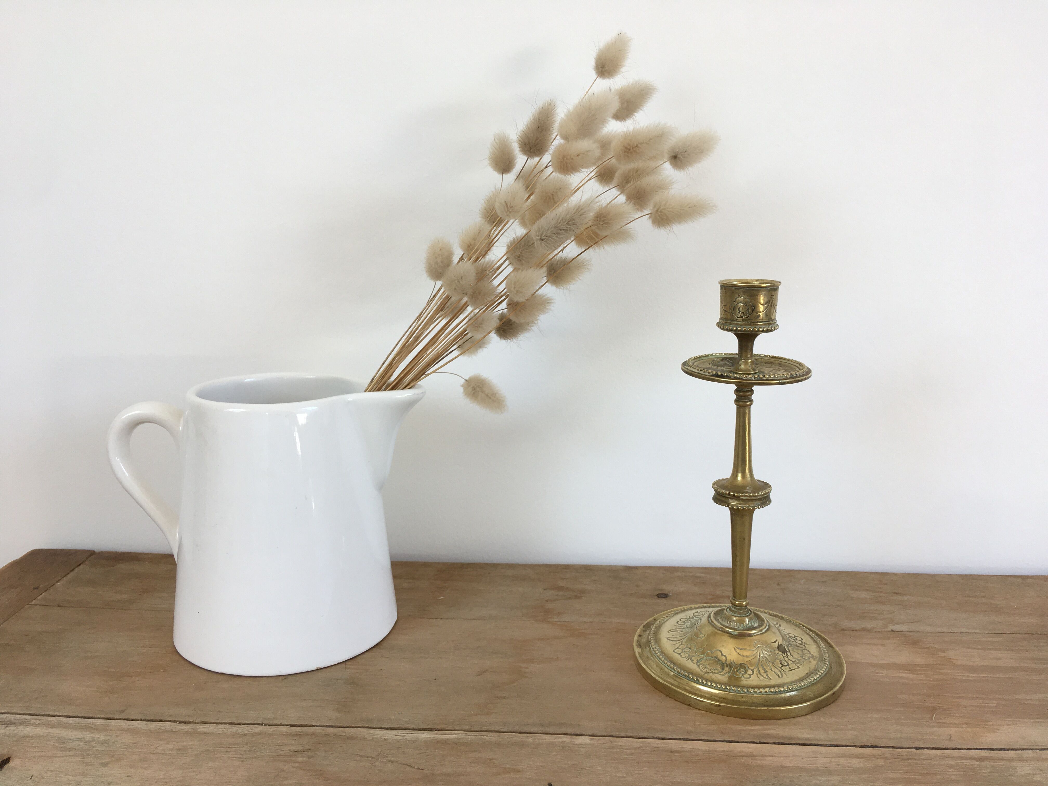 Chiseled brass candle holder