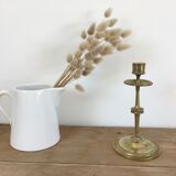 Chiseled brass candle holder