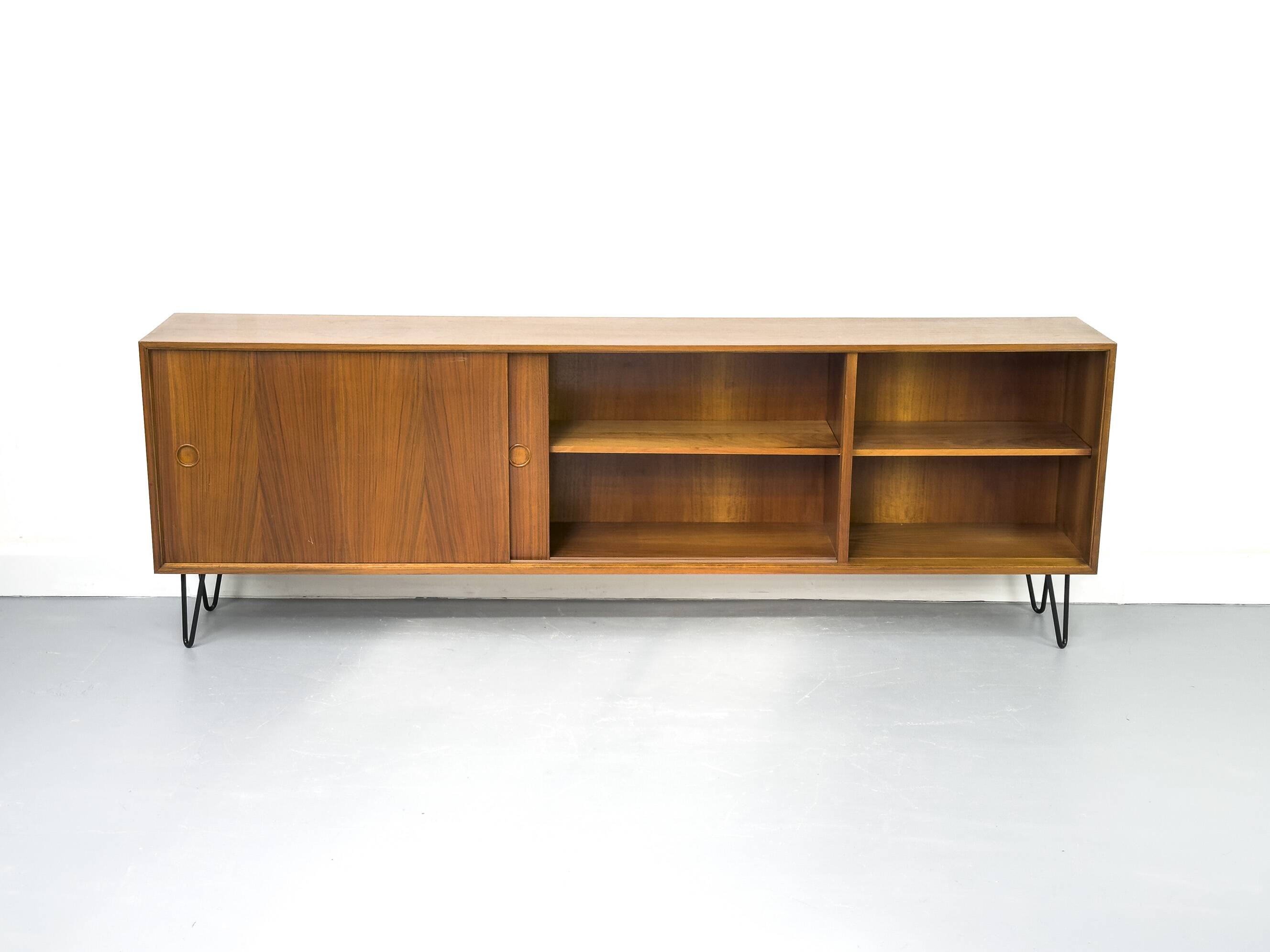 Walnut sideboard with sliding doors by Franzmeyer, 1959
