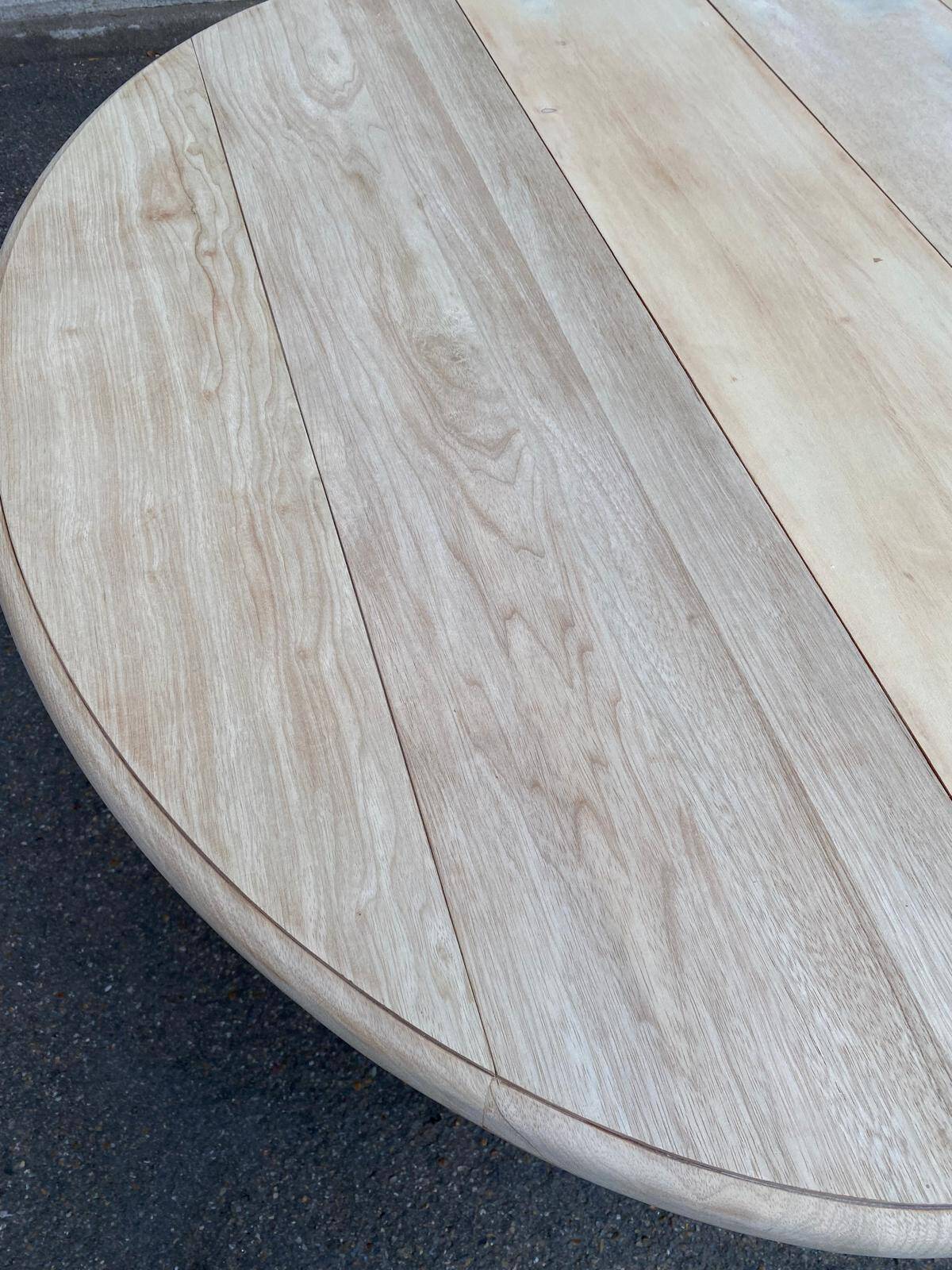 Renovated Louis Philippe round extendable dining table with flaps and 3 extensions.
