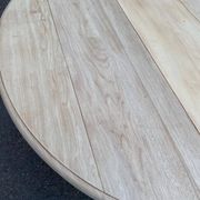 Renovated Louis Philippe round extendable dining table with flaps and 3 extensions.