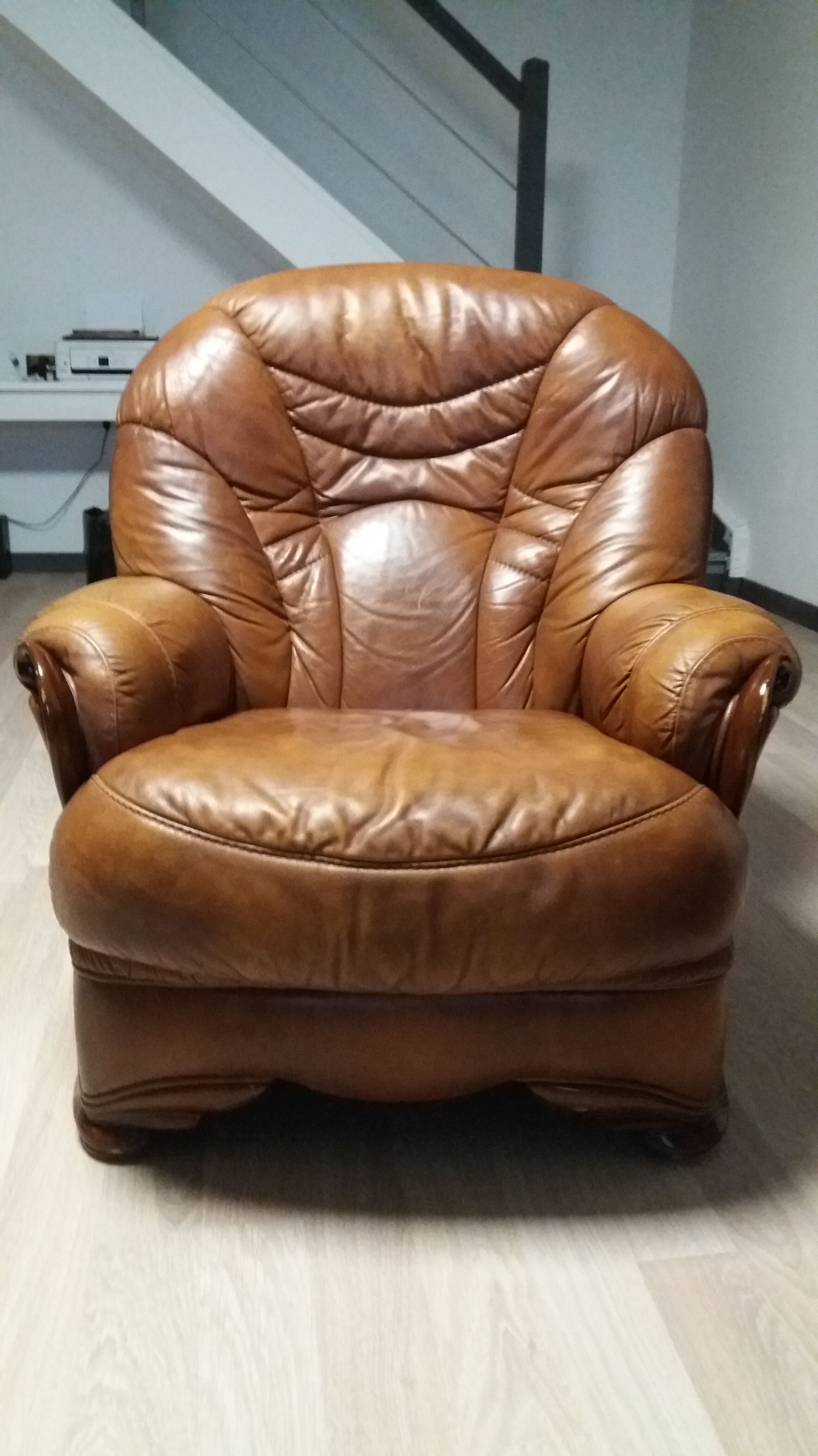 Brown leather armchair