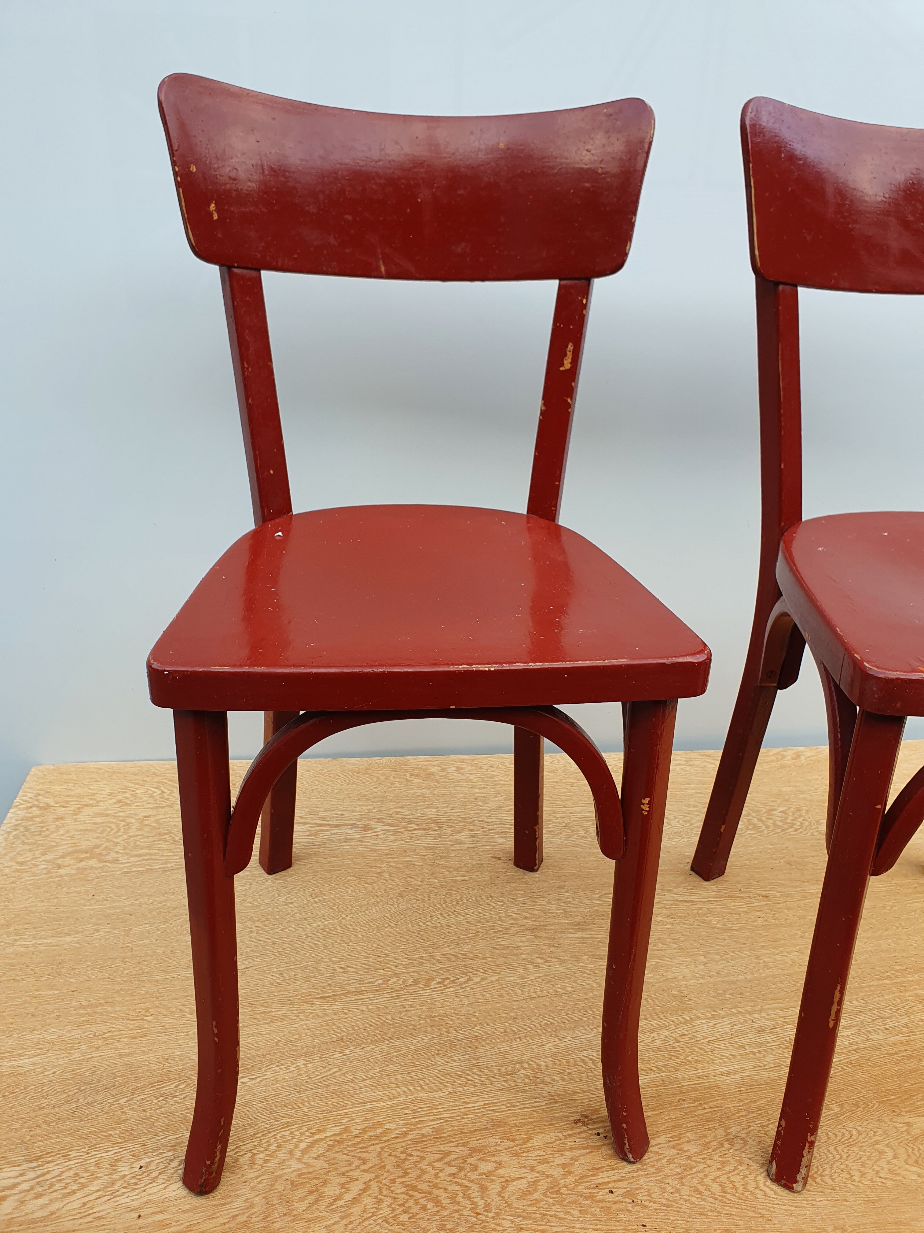 4 red chairs bistro Baumann