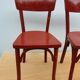 4 red chairs bistro Baumann