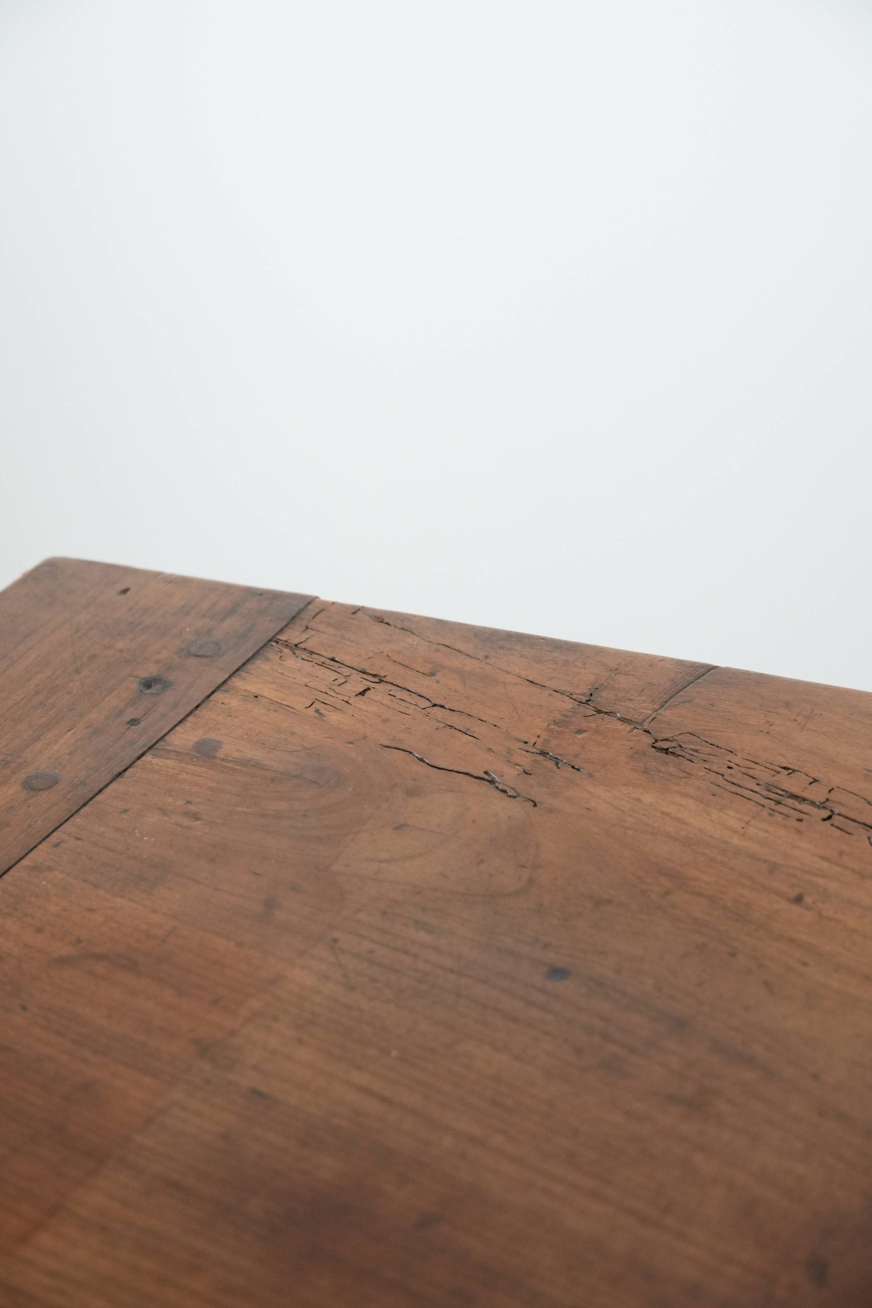 Elegant and subtle antique French dining table made of fruitwood