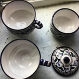 Two cups and a sugar bowl