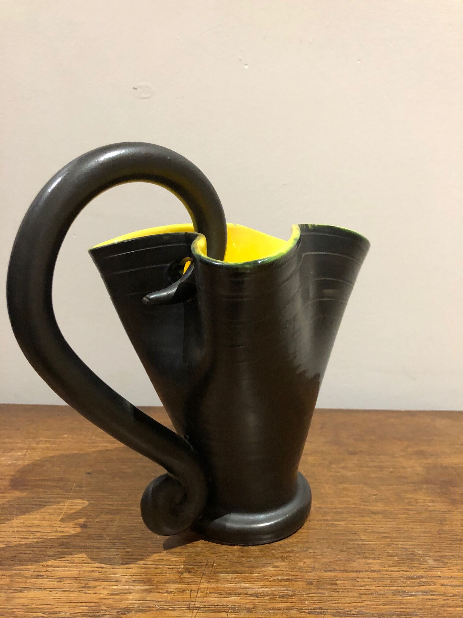 black and yellow vallauris pitcher