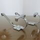 Pair of chrome metal coat hooks from the 1970s.