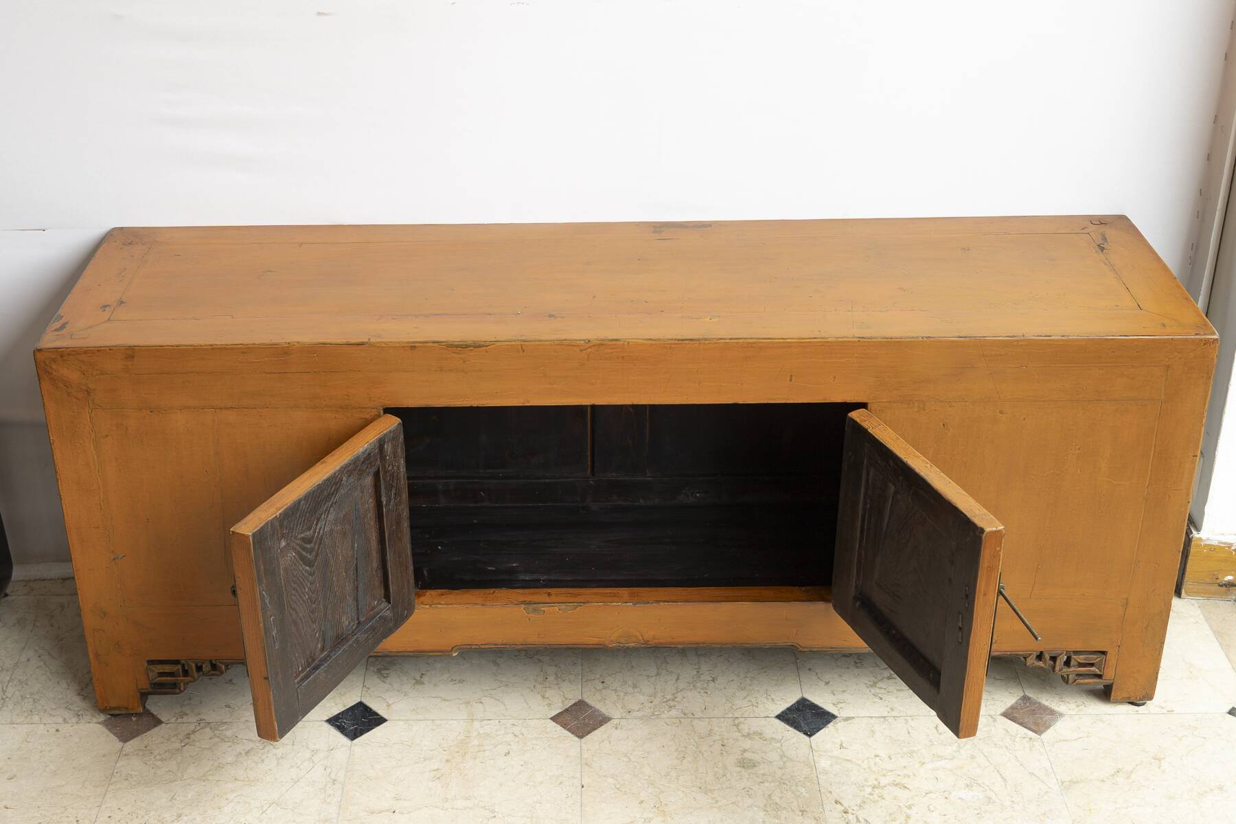 Low enfilade in orange lacquered elm