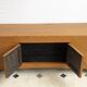 Low enfilade in orange lacquered elm