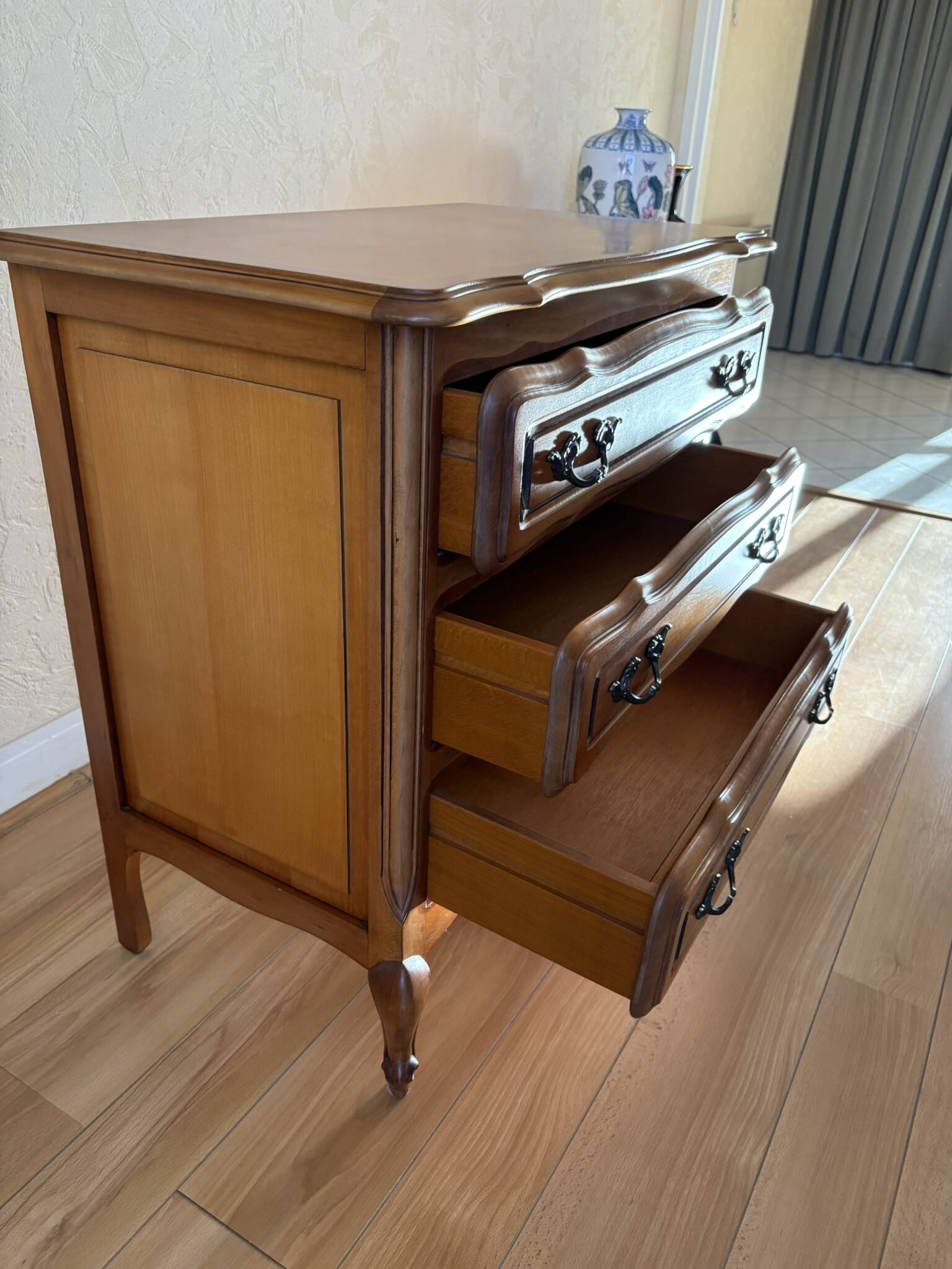 Vintage wooden chest of drawers, Louis XV style with curved drawers