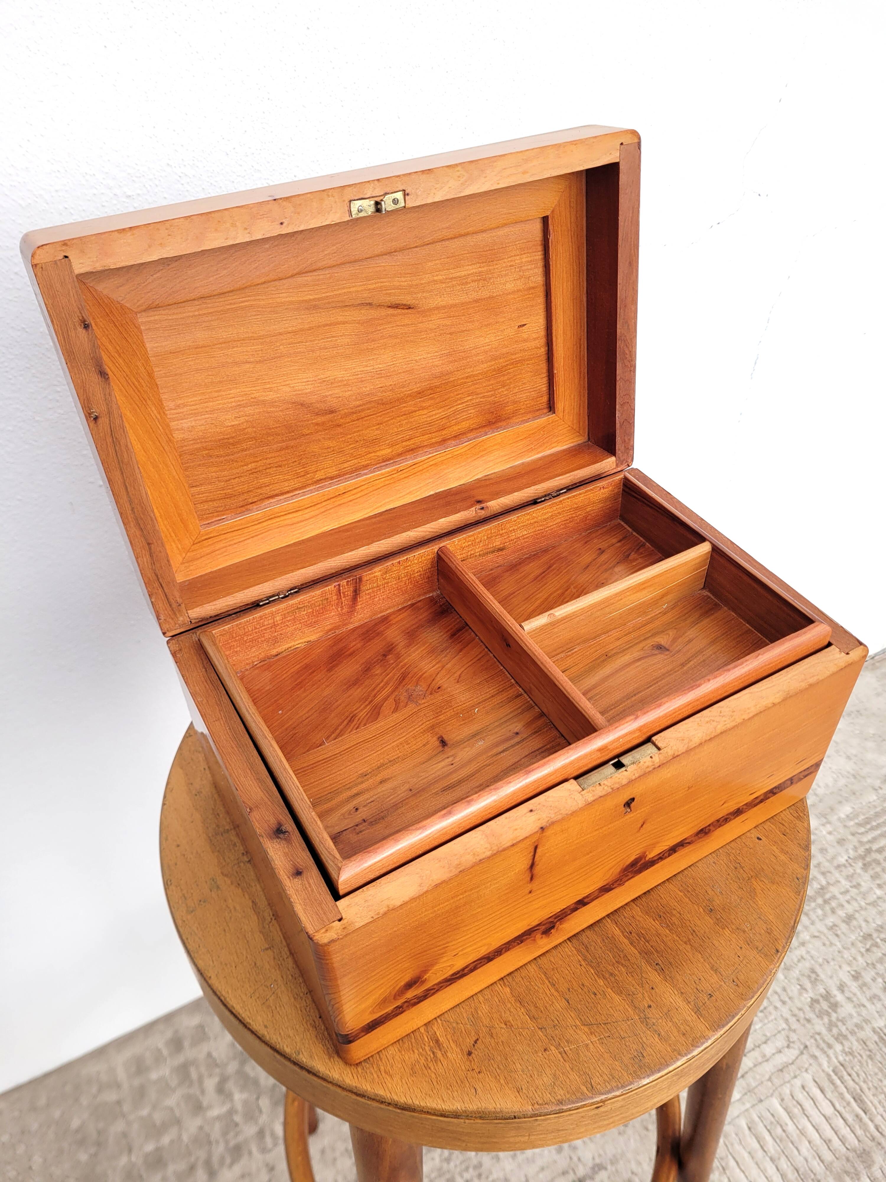 Old compartmentalized jewelry box