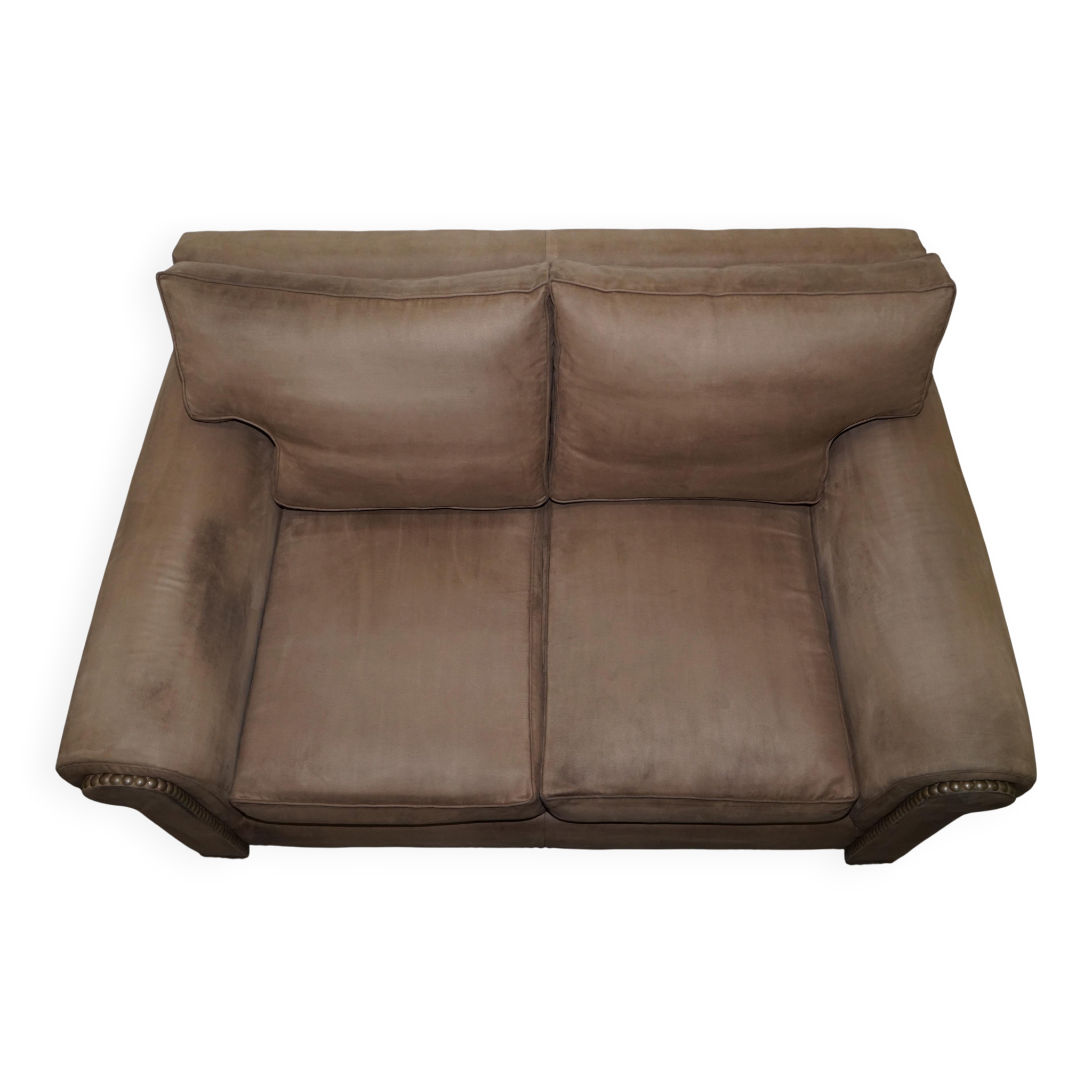 Ralph Lauren Jamaica velvet sofa pair with feather cushions.