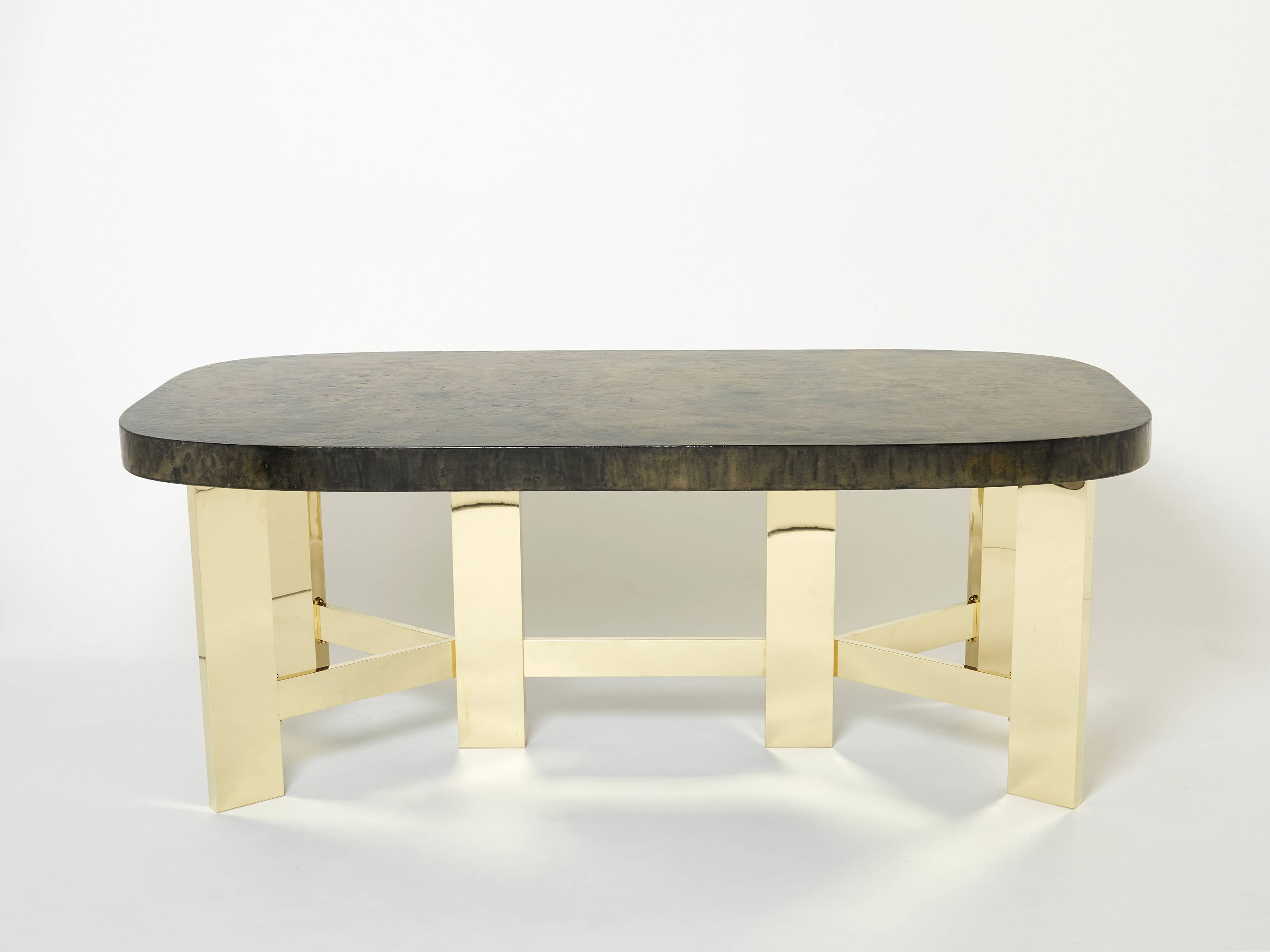 Brutalist Belgian dining table in resin and brass from around 1970.