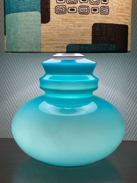 Blue opaline table lamp and vintage Maori fabric