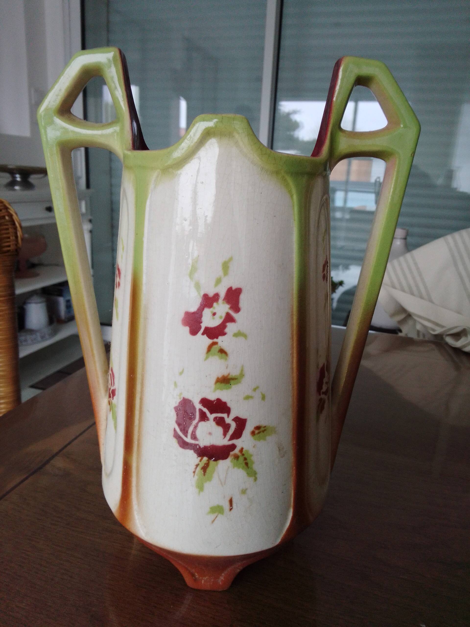 Antique faience barbotine vase