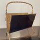 Magazine rack in bronze from the 50/60s