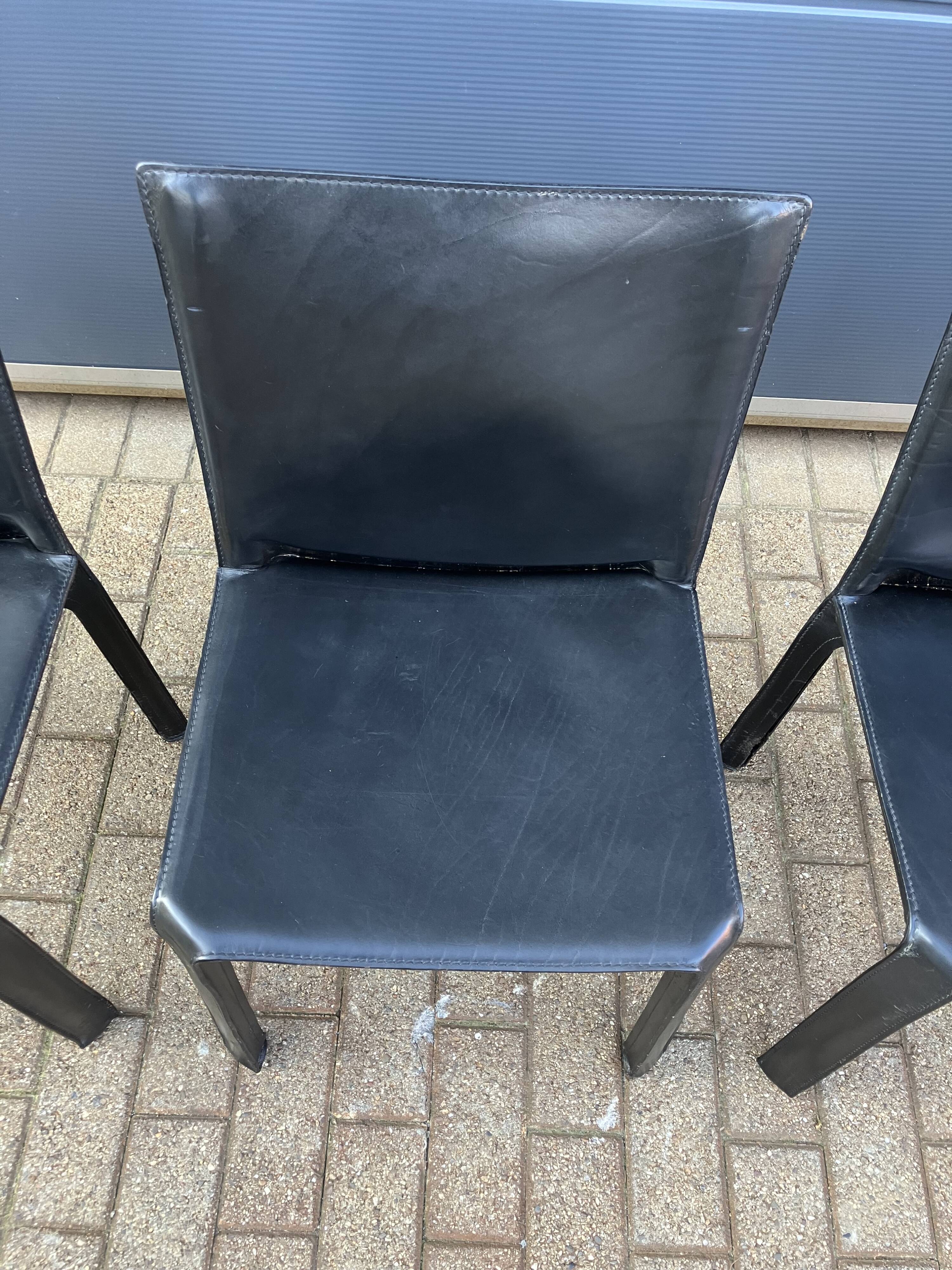 4 black Cassina Cab chairs by Mario Bellini