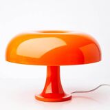 Nessino Table lamp in orange plastic / Ø 32 cm - Reissue from the 1960s - Artemide