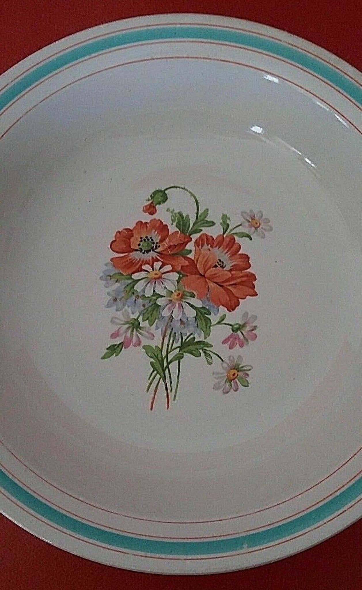Hollow earthenware dish Saint Amand early twentieth floral decoration