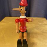 Statuette de pinocchio en bois articule jouet ancien