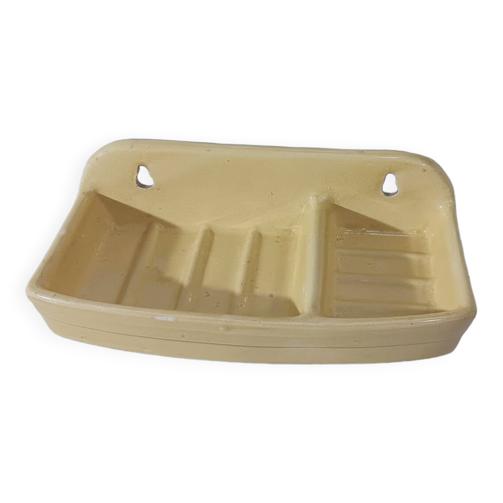 Pale yellow ceramic soap dish