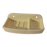 Pale yellow ceramic soap dish