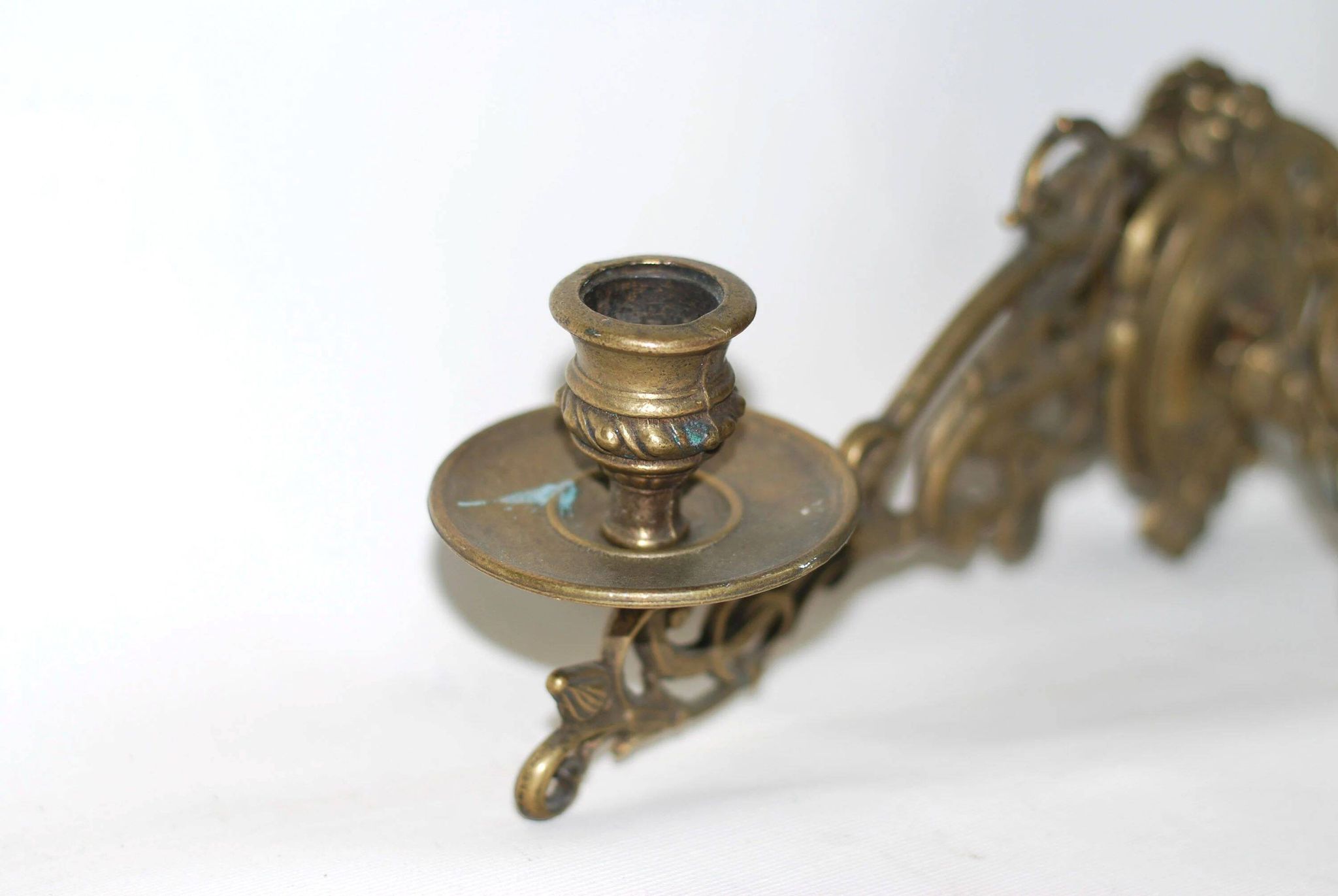 Pair of wall candle holders in brass