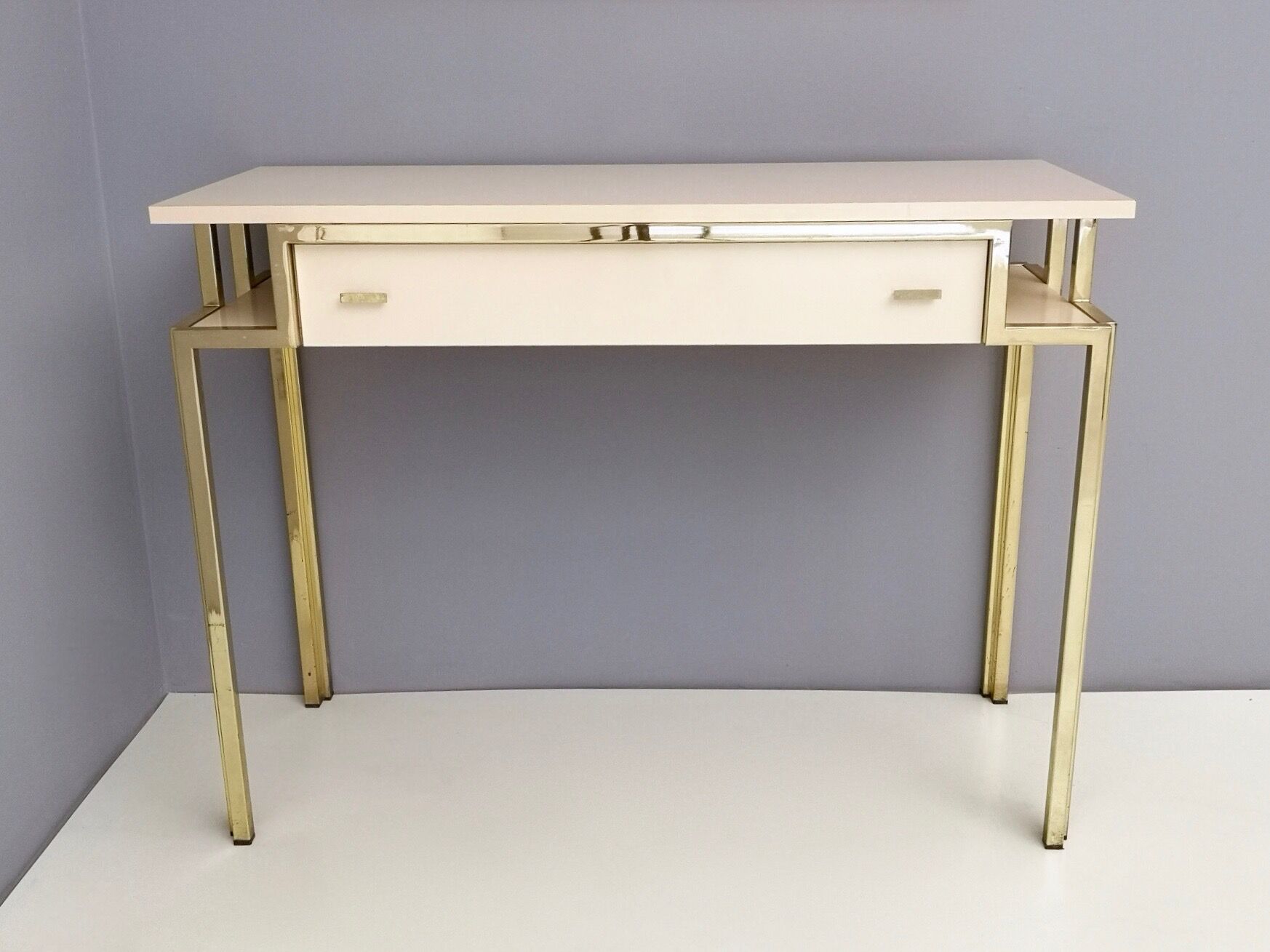 Postmodern pale pink formica and brass console with wall mirror, italy
