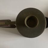 Modernist Italian pitcher design from the 1960s in patinated wood and metal.