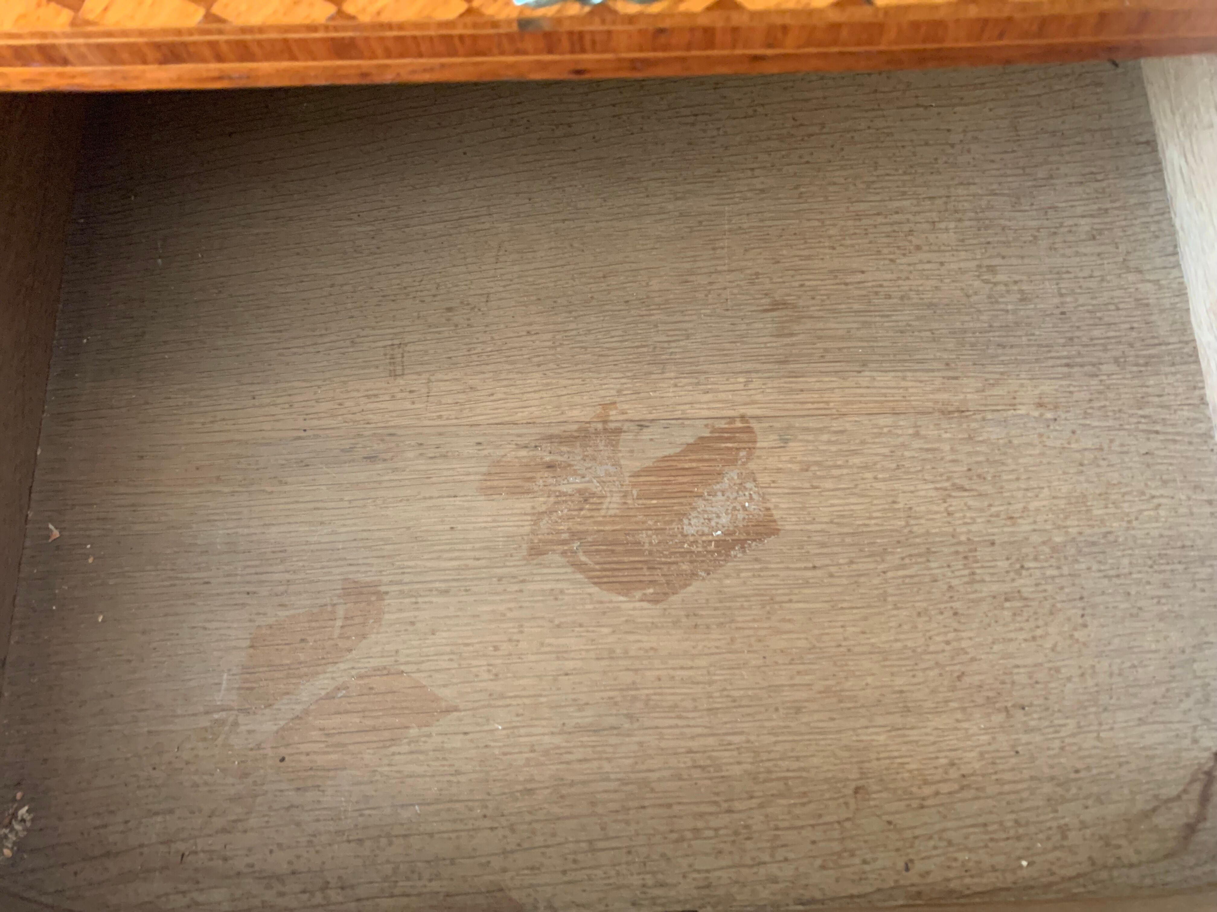 Louis XVI style half-moon chest of drawers in late nineteenth century marquetry