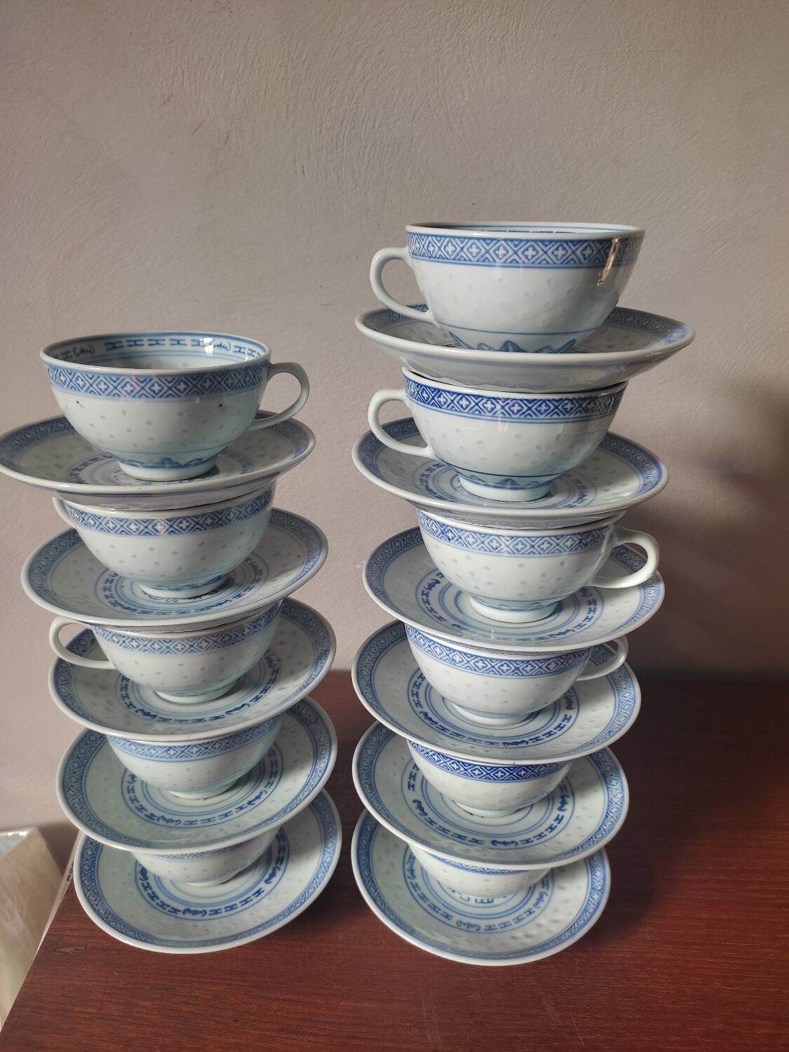 11 cups and saucers in vintage Chinese porcelain