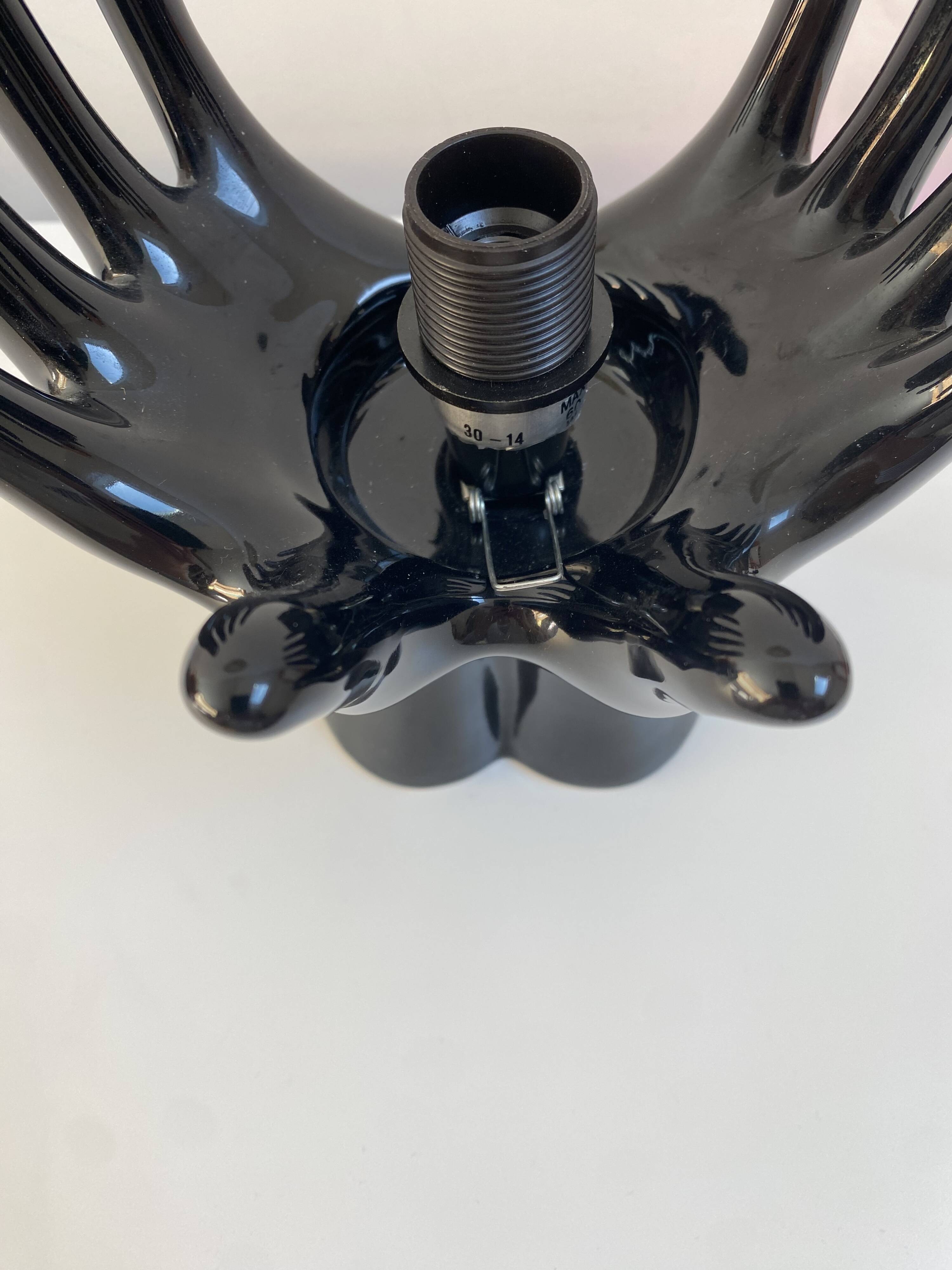 Sculpted ceramic globe lamp.