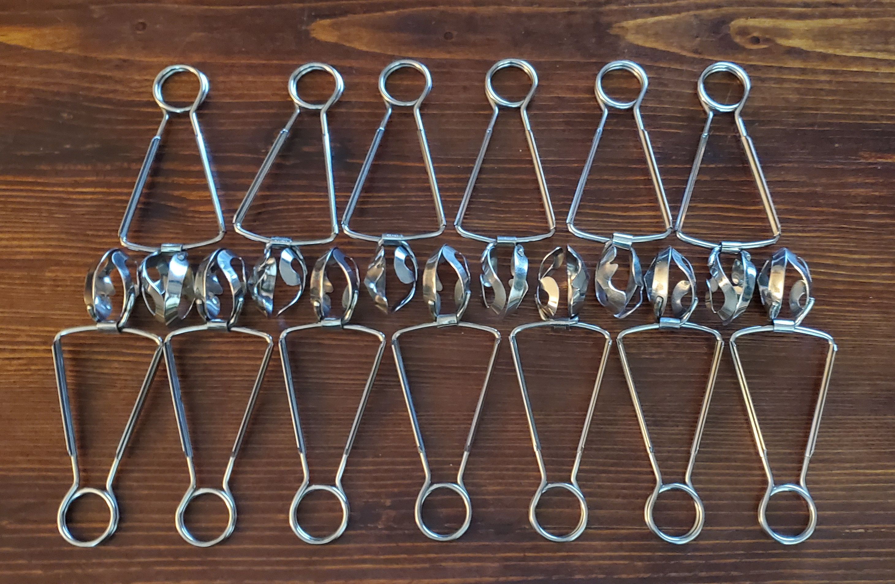 Lot de 12 pinces à escargot en inox