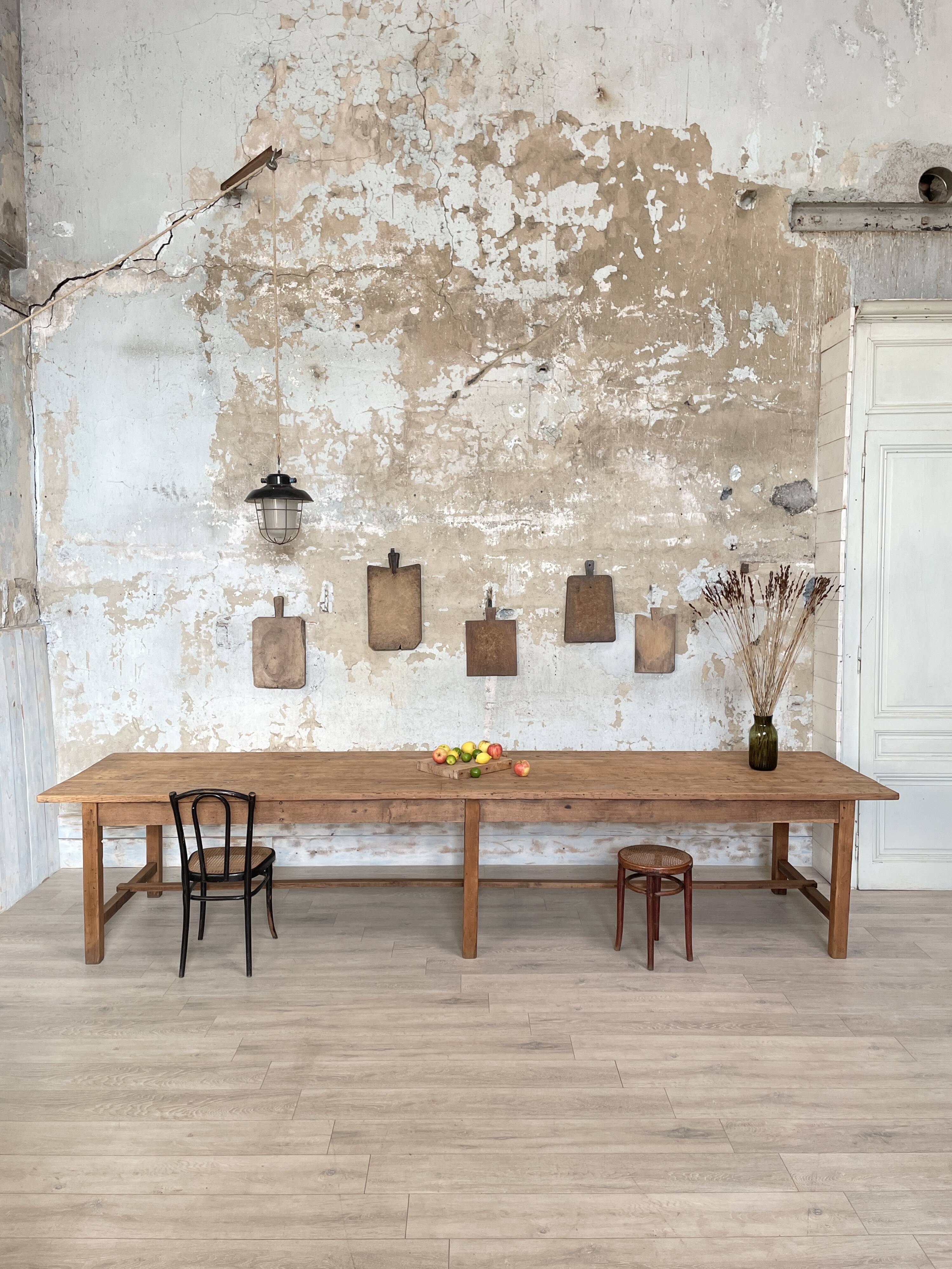 Solid wood workshop table with straight legs.