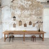 Solid wood workshop table with straight legs.