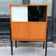 Bookcase, coloured windows, metal base, 1960