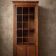 Small Parisian glass-fronted cabinet in oak from the late 19th century – a timeless ally for small spaces.