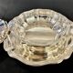 Christofle Gallia vegetable dish and its silver-plated serving platter.