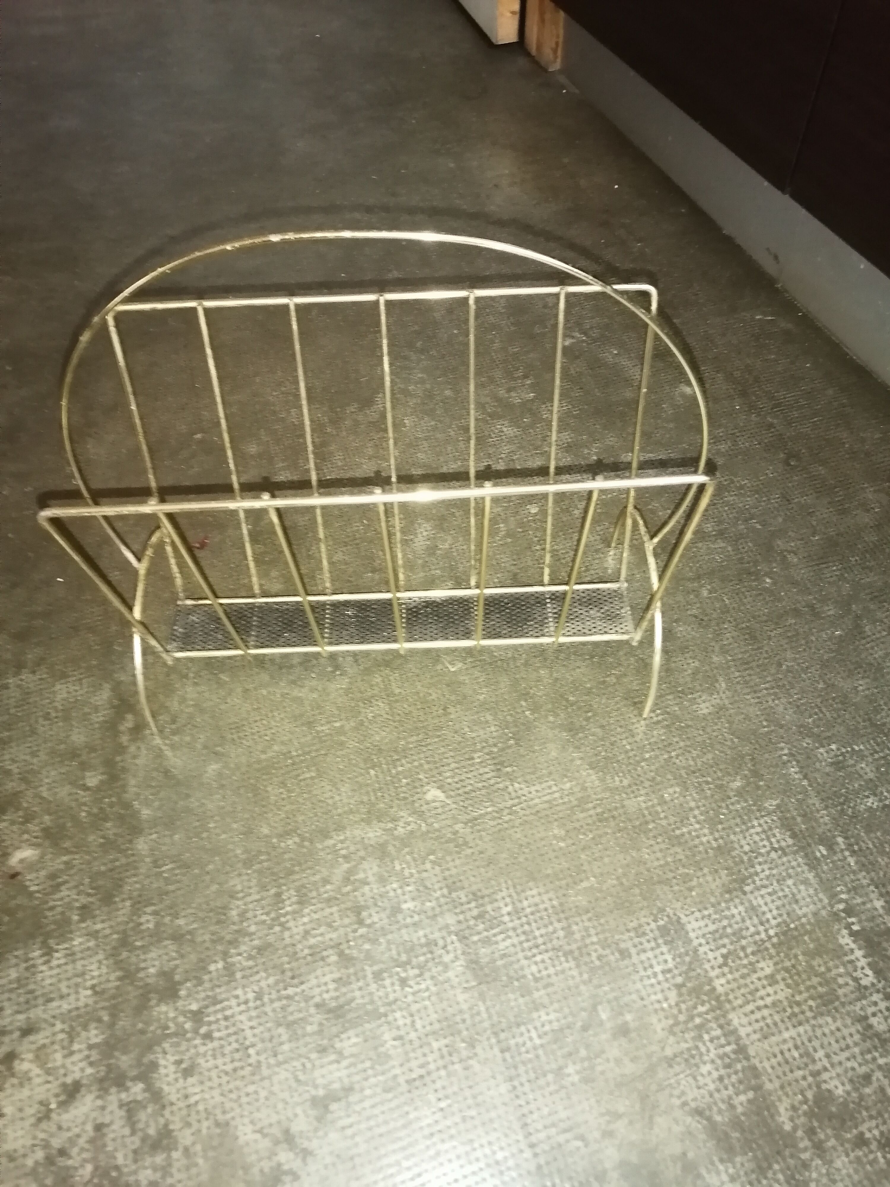 Vintage metal metal perforated magazine holder