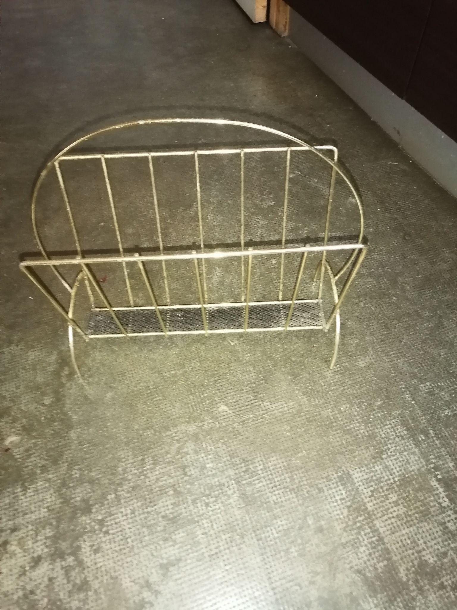 Vintage metal metal perforated magazine holder