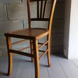 Blond wooden bistot chair from the 50s.