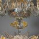 Venetian chandelier in gilded Murano glass, 24 light sources, three tiers, circa 1940.