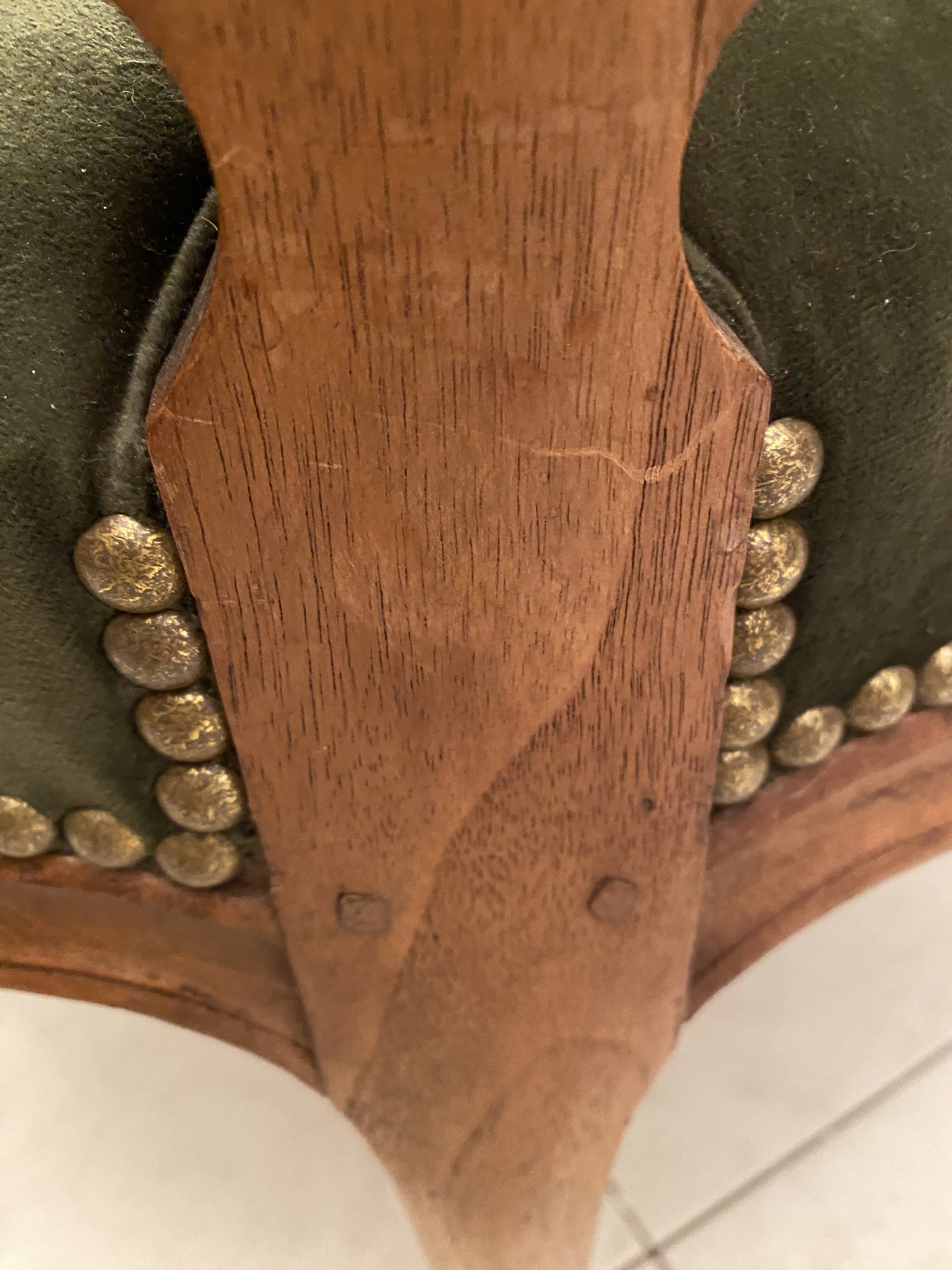 Paire de fauteuils en bois sculpté, XXème s.