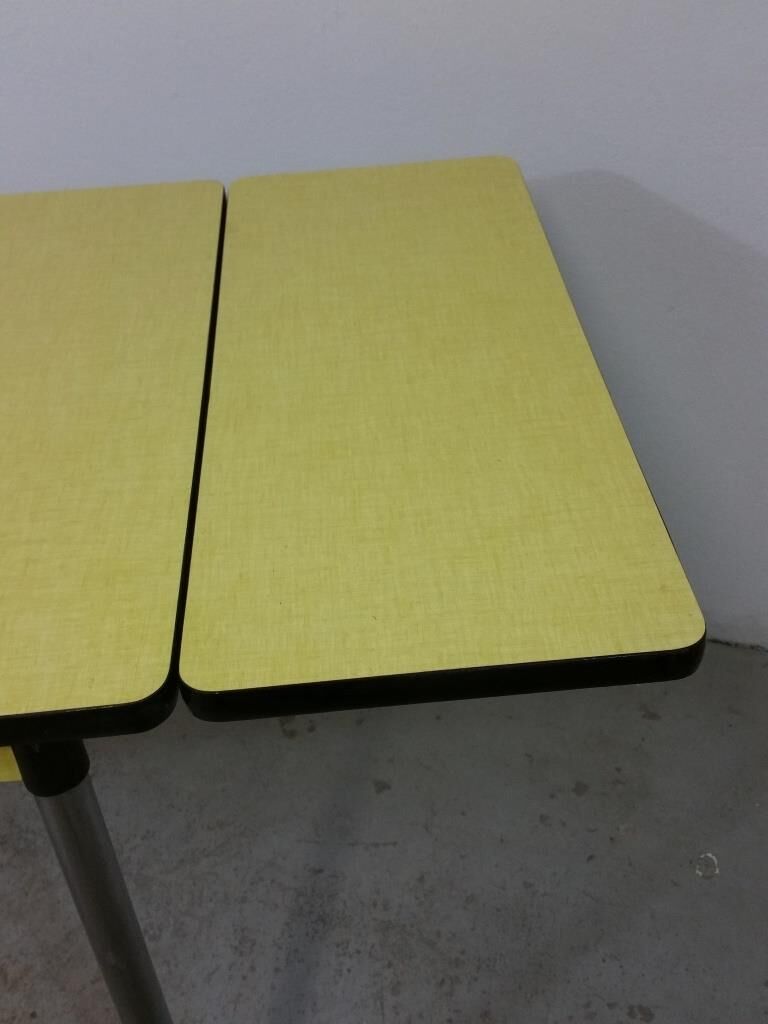 Table and chairs in formica yellow