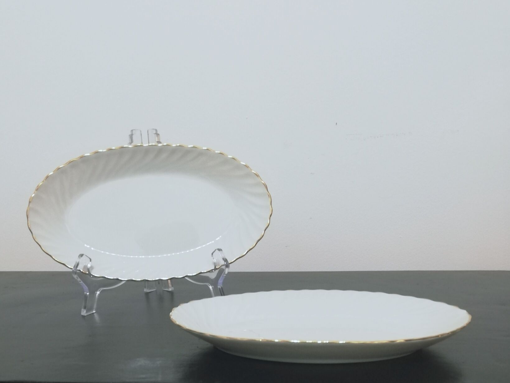 Two porcelain raviers signed Ph. Deshoulieres